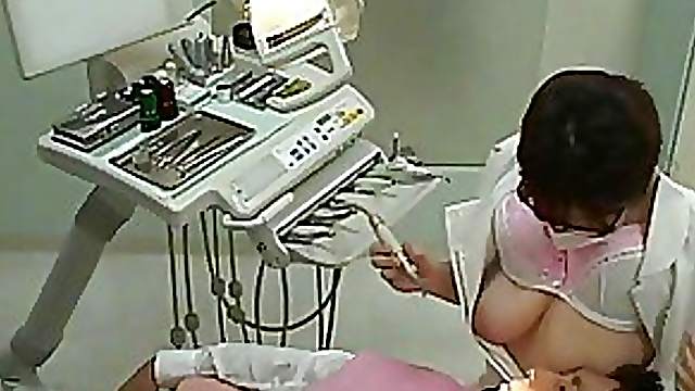 Vicious Japanese Dentist Jerks Off Her Clients While They Suck Her Big Jugs