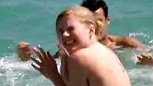 Sexy Eva Birthistle Wearing a Bikini on a Beach - 'A Fond Kiss' Scene