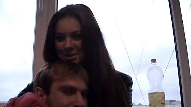 Slender brunette prostitute goes for a walk