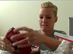 Sweet blonde Sophie Moone continues examining her presents