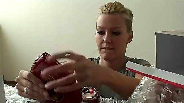 Sweet blonde Sophie Moone continues examining her presents