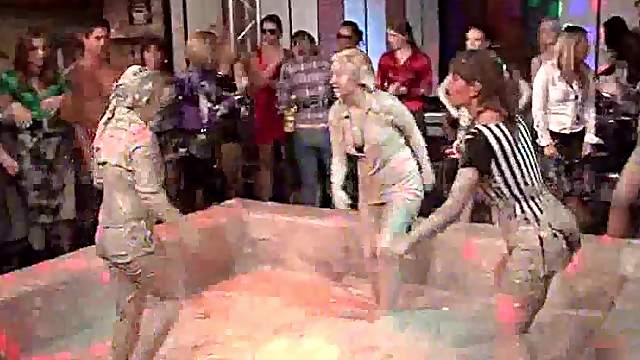 Hot lesbos show their mud covered bodies at a sex party