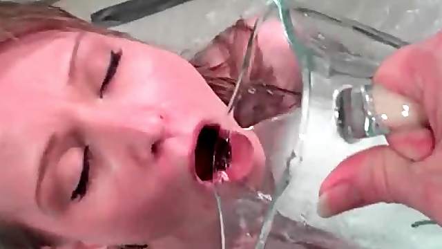 Dirty blonde slut drinking her own piss with lust