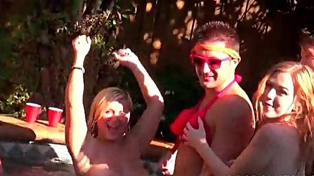 Hot blonde gets pussy pounded at a pool sex party