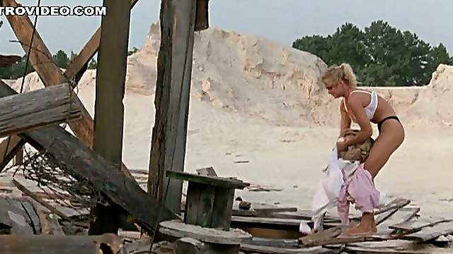 Nothing Looks Better On Erika Eleniak Than That White Bra