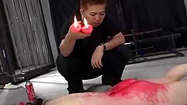 Red candle drips are all over this Japanese's ass