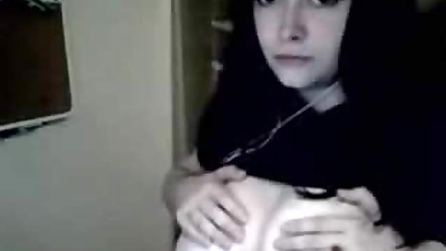 Young girl plays with huge tits