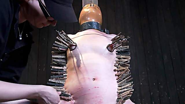 Sarah Shevon rides a fucking machine while being pinched