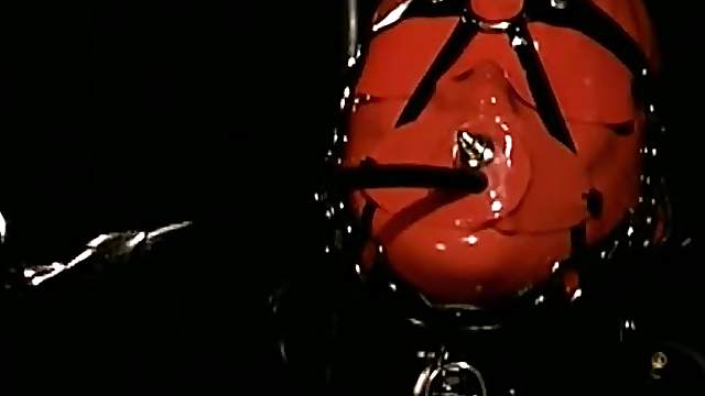 Lesbian Latex Dominatrices Humiliate a Submissive Male