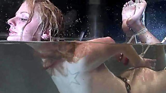 Honey gets hogties and thrown in the immersion tank