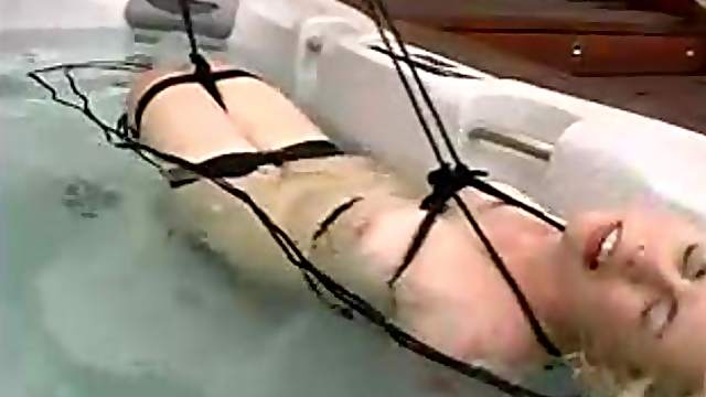 Tied up Lorelei Lee gets humiliated in a bathtub in a backyard