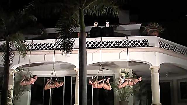 Three tied up girls get humiliated on a lawn late at night