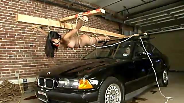 Mika Tan gets lies on a car hood and gets punished