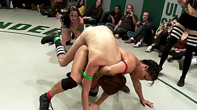 A few horny lesbians enjoy wrestling and banging on tatami