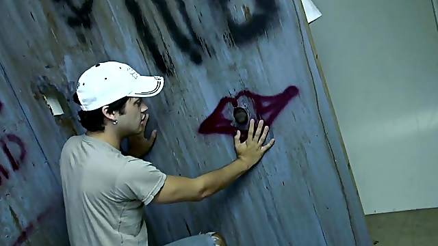 Homosexual Orion Cross sucks a big black cock in gloryhole video