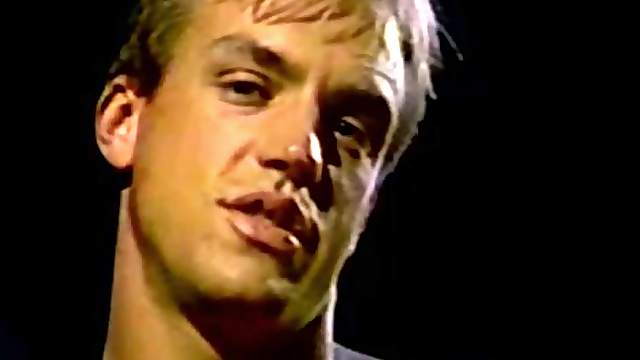 Blond poofter enjoys playing with his hard dick in a bedroom