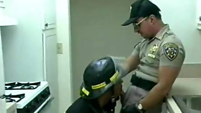 Hot fireman and a sexy gay cop blow each other