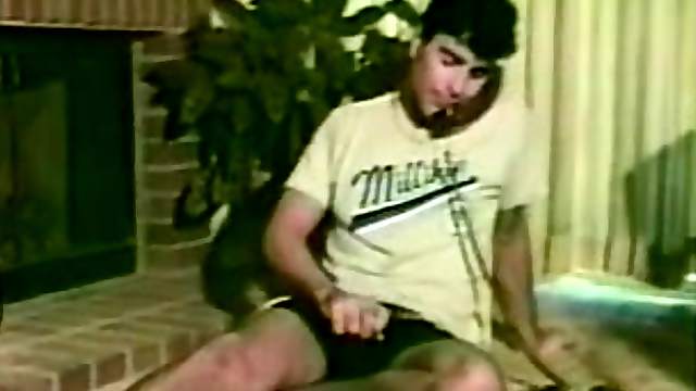 Horny gay stud jerks his fat cock while on the phone