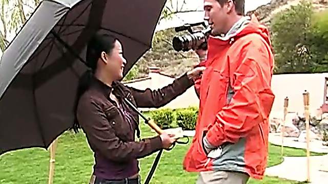 He takes the camera from the Asian girl and convinces her to suck dick
