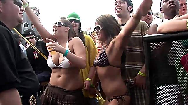 Outdoor party featuring model in bikini shaking their nice ass