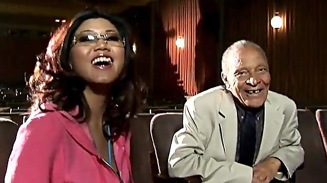 Charming Asian MILF takes interview backstage before shooting begins