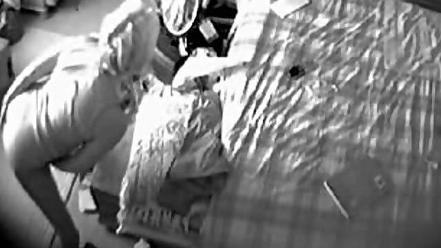 Amateur blonde masturbates in front of security cam