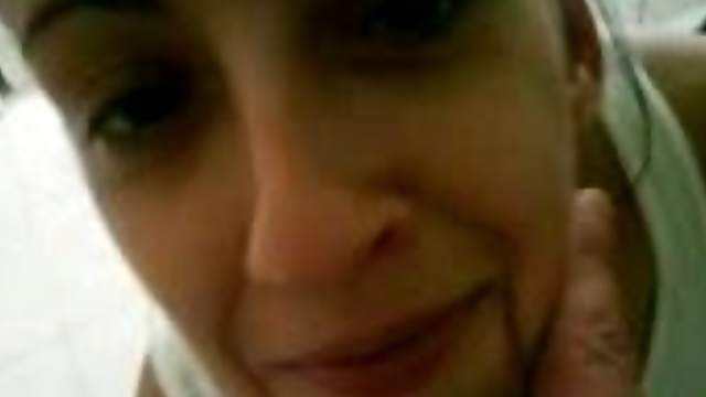 Homemade clip with a pretty brunette chick showing her tits