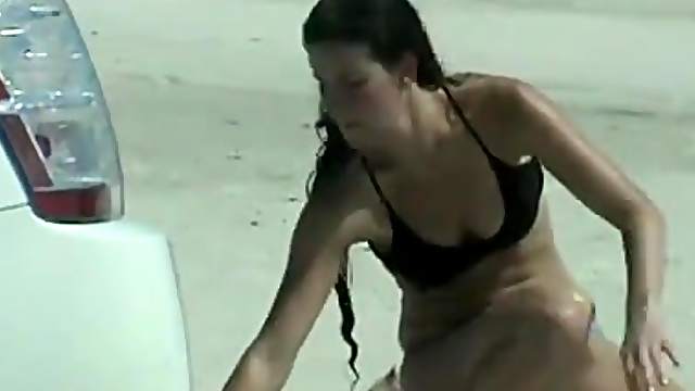 Sexy amateur chicks wearing bikinis get caught on a cam at a beach