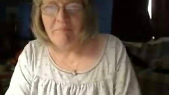 Chubby granny shows her big natural tits and shaved vag for the webcam