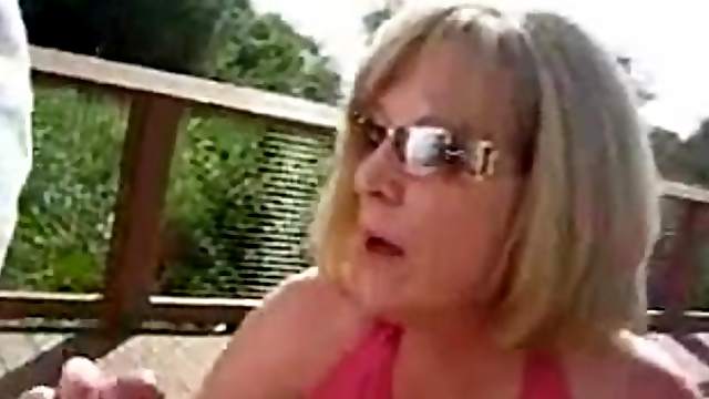 Amateur blond in glasses sucks a prick in homemade clip