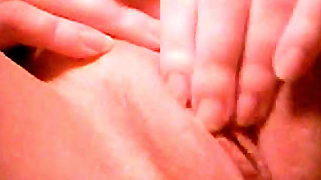 Horny amateur chick fingers her shaved pussy in close up solo clip