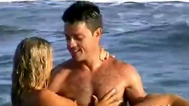 Nude blonde has fun with her BF on a beach in outdoor scene