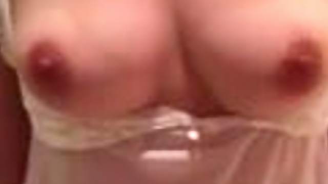 Amateur bitch flashes her natural tits for the webcam