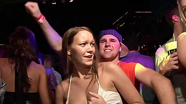 Randy models in the club partying and kissing while showing tits