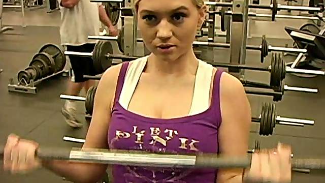 Lewd blonde Alison Angel flashes her natural boobs in a gym