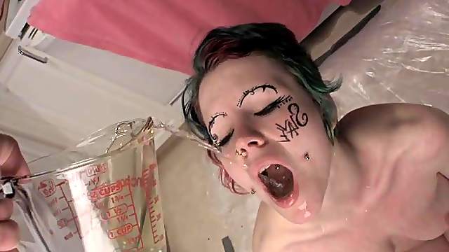 Hot BDSM work on her hot naked body with piss