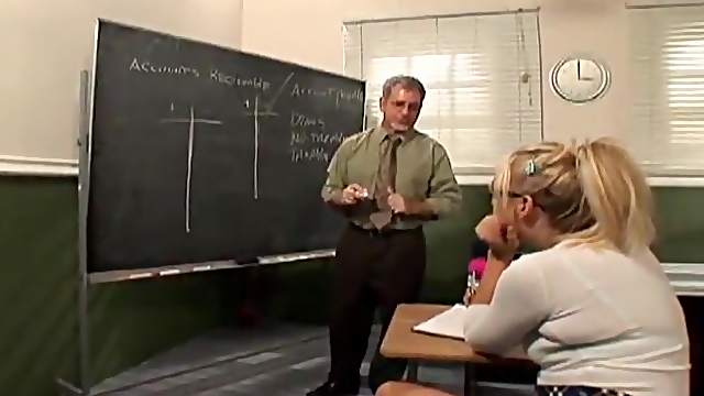 Blonde with glasses sucking an old man's cock