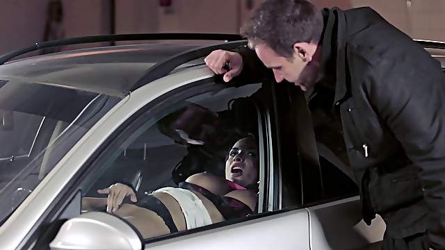 In a parking lot this couple strips down and fucks