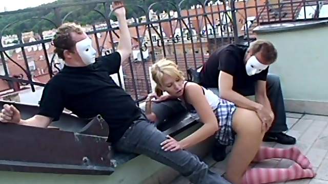 Mini-skirt clad teen with pigtails enjoying a hardcore threesome