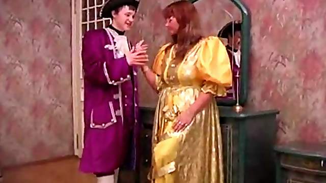 Lustful couple in fancy costumes fucking in bed hardcore