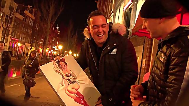 He shops around the red light district for just the right hooker