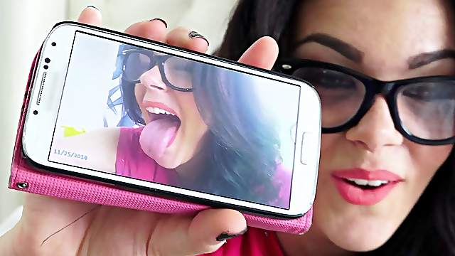 Nerd babe records herself giving head with her phone