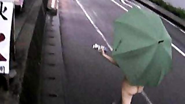 Yuka Kurihara walks naked flashing the public in the rain
