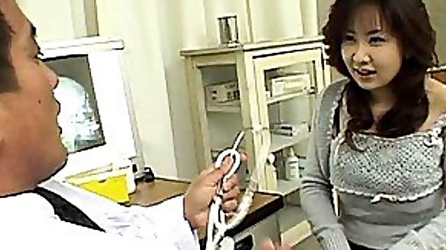 Nanami Komachi Asian Girl shows boobs to her doctor for examining