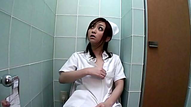 Nurse sneaks into the bathroom to masturbate with a vibrator