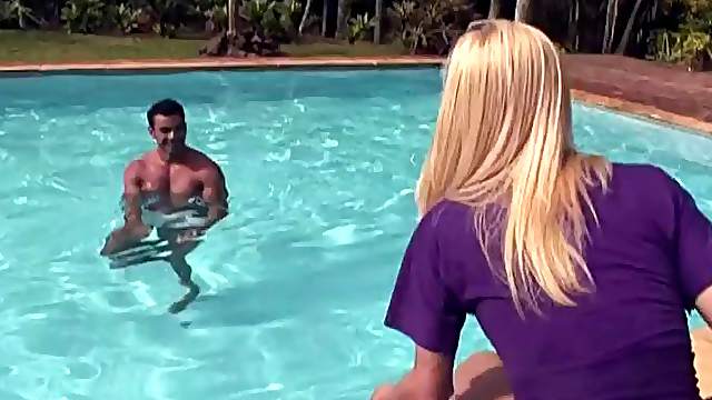 Blonde tranny gives her muscular friend a good doggy drilling