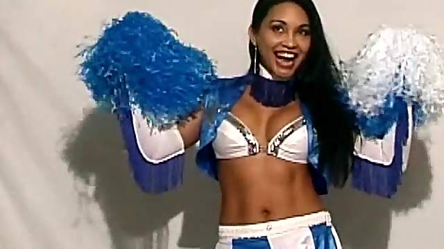 Fit cheerleader beauty fucking a dildo into her wet pussy