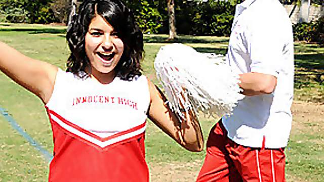 Adorable brunette cheerleader strips down and gets fucked in the locker room