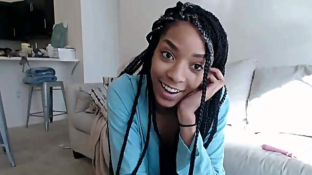 Sweet black babe toys her horny cunt