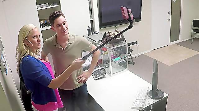 Blonde taking slutty selfies and fucking a guy at work